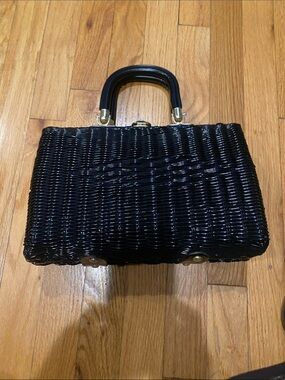 Elegant Black Woven Top-Handle Bag with Gold Accents